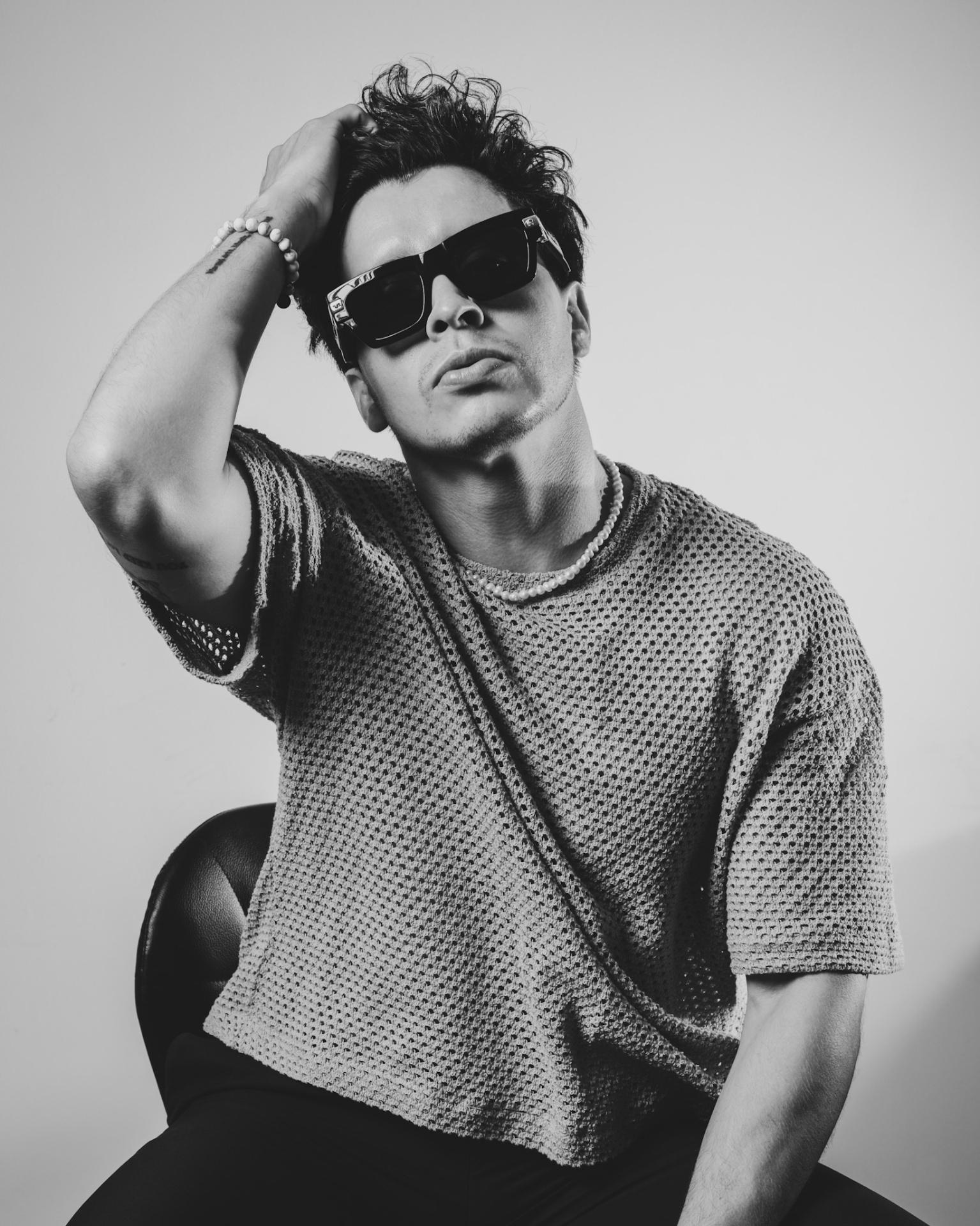 Editorial black and white portrait with sunglasses